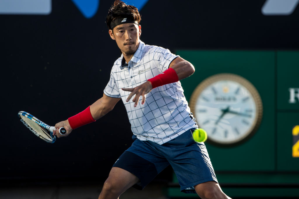 MELBOURNE, VIC - JANUARY 15: Yuichi Sugita of Japan plays a shot during the 2018 Australian Open on January 15, 2018, at Melbourne Park Tennis Centre in Melbourne, Australia.(Photo by Jason Heidrich/Icon Sportswire via Getty Images)