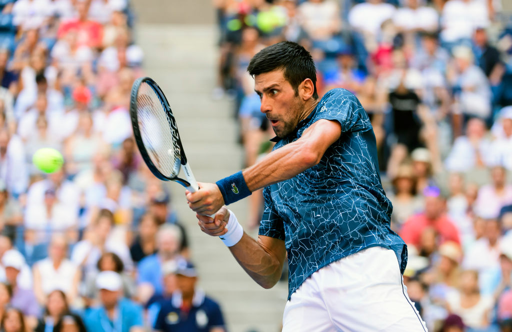 NEW YORK, NY - SEPTEMBER 03: Novak Djokovic of Serbia in action against Joao Sousa of Portugal in the fourth round of the US Open at the USTA Billie Jean King National Tennis Centre on September 03, 2018 in New York City, United States. (Photo by TPN/Getty Images)"n"n